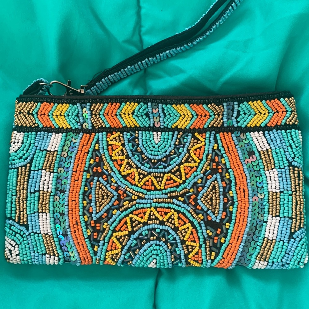 Gorgeous hand beaded wrist strap clutch bag w zipper. Vibrant color. NWT